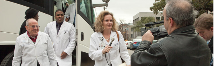 Physicians on Camera Outside of Bus