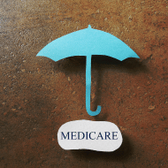 Image of a blue umbrella over the word Medicare