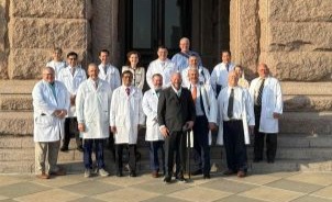 TMA leadership physicians standing on the steps outside the Texas Capitol building